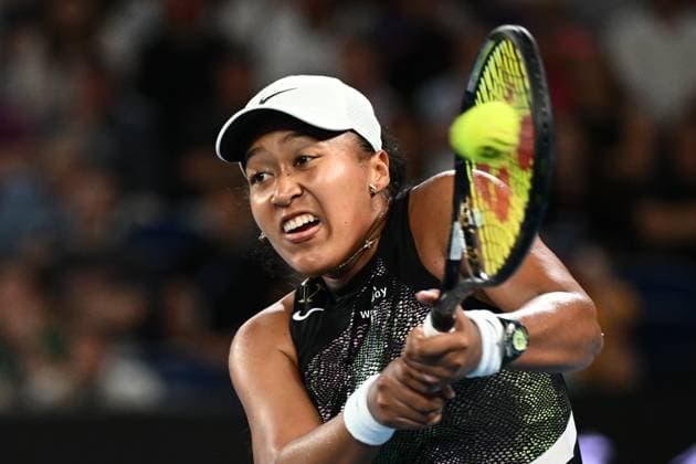TENNIS AUSTRALIAN OPEN, Naomi Osaka of Japan returns during her first round match against Caroline Garcia of France on Day 2 of the 2024 Australian Open at Melbourne Park in Melbourne, Monday, January 15, 2024. ( NO ARCHIVING, EDITORIAL USE ONLY, NO USE IN BOOKS WITHOUT CONSENT MELBOURNE VICTORIA AUSTRALIA  Copyright: xJOELxCARRETTx 20240115001889290847