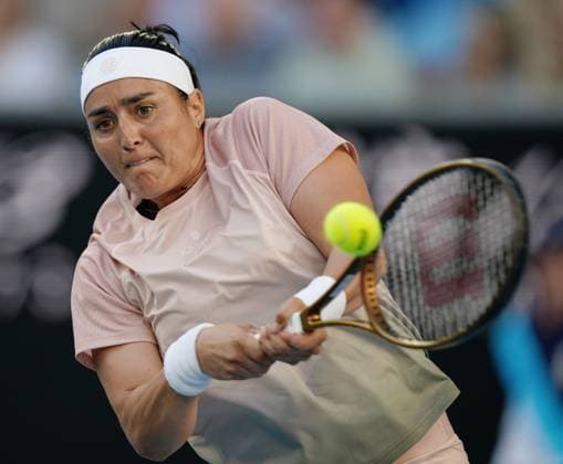(240115) -- MELBOURNE, Jan. 15, 2024 -- Ons Jabeur of Tunisia hits a return during the women s singles first round match between Ons Jabeur of Tunisia and Yuliia Starodubtseva of Ukraine at Australian Open tennis tournament in Melbourne, Australia, Jan. 15, 2024. ) (SP)AUSTRALIA-MELBOURNE-TENNIS-AUSTRALIAN OPEN WangxShen 