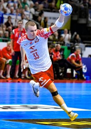 15 01 2024, xlakx, Handball EHF European Handball Championship 2024, Poland Faroe Islands emspor, v l Jakub Szyszko Poland 33 Berlin