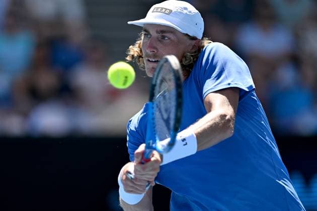 TENNIS AUSTRALIAN OPEN, Max Purcell of Australia returns during his match against Mate Valkusz of Hungary on Day 3 of the 2024 Australian Open at Melbourne Park in Melbourne, Tuesday, January 16, 2024. ( NO ARCHIVING, EDITORIAL USE ONLY, NO USE IN BOOKS WITHOUT CONSENT MELBOURNE VICTORIA AUSTRALIA  Copyright: xLUKASxCOCHx 20240116001889630855