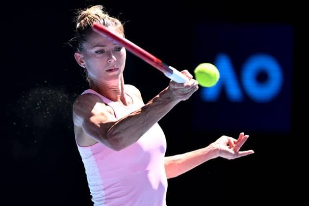 TENNIS AUSTRALIAN OPEN, Camila Giogi of Italy returns during her round 1 match against Victoria Azarenka of Belarus on Day 3 of the 2024 Australian Open at Melbourne Park in Melbourne, Tuesday, January 16, 2024. ( NO ARCHIVING, EDITORIAL USE ONLY, NO USE IN BOOKS WITHOUT CONSENT MELBOURNE VICTORIA AUSTRALIA  Copyright: xJOELxCARRETTx 20240116001889640424