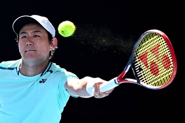 TENNIS AUSTRALIAN OPEN, Yoshihito Nishioka of Japan returns during his round 1 match against Holger Rune of Denmark on Day 3 of the 2024 Australian Open at Melbourne Park in Melbourne, Tuesday, January 16, 2024. ( NO ARCHIVING, EDITORIAL USE ONLY, NO USE IN BOOKS WITHOUT CONSENT MELBOURNE VICTORIA AUSTRALIA  Copyright: xJOELxCARRETTx 20240116001889643639