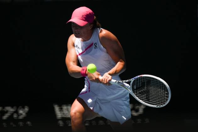 Iga Swiatek (POL) in action during her first round match Australian Open, Day Two, Tennis, Melbourne Park, Melbourne, Australia - 16 Jan 2024  Copyright: xJamesxGourley Shutterstockx 14302243be