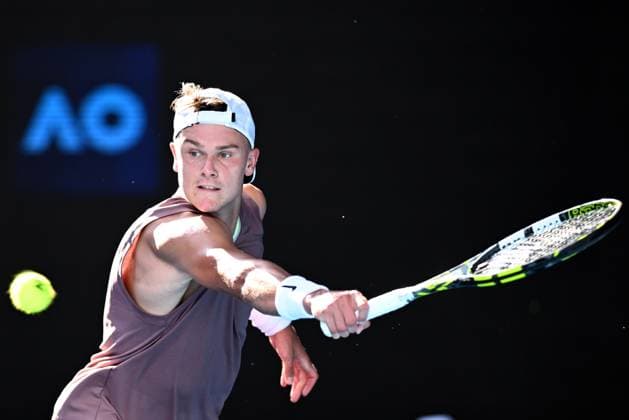 TENNIS AUSTRALIAN OPEN, Holger Rune of Denmark in action during his round 1 win over Yoshihito Nishioka of Japan on Day 3 of the 2024 Australian Open at Melbourne Park in Melbourne, Tuesday, January 16, 2024. ( NO ARCHIVING, EDITORIAL USE ONLY, NO USE IN BOOKS WITHOUT CONSENT MELBOURNE VICTORIA AUSTRALIA  Copyright: xJOELxCARRETTx 20240116001889659938