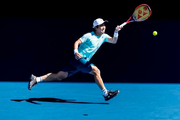 MELBOURNE, VIC - JANUARY 16: Yoshihito Nishioka of Japan in action during Round 1 of the 2024 Australian Open on January 16 2024, at Melbourne Park in Melbourne, Australia. (Photo by Jason Heidrich Icon Sportswire) TENNIS: JAN 16 Australian Open EDITORIAL USE ONLY Icon240116164