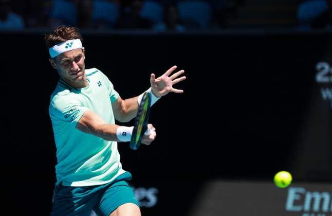 (240116) -- MELBOURNE, Jan. 16, 2024 -- Casper Ruud of Norway returns a shot during the men s singles 1st round match between Casper Ruud of Norway and Albert Ramos-Vinolas of Spain at Australian Open tennis tournament in Melbourne, Australia, Jan. 16, 2024. ) (SP)AUSTRALIA-MELBOURNE-TENNIS-AUSTRALIAN OPEN MaxPing 