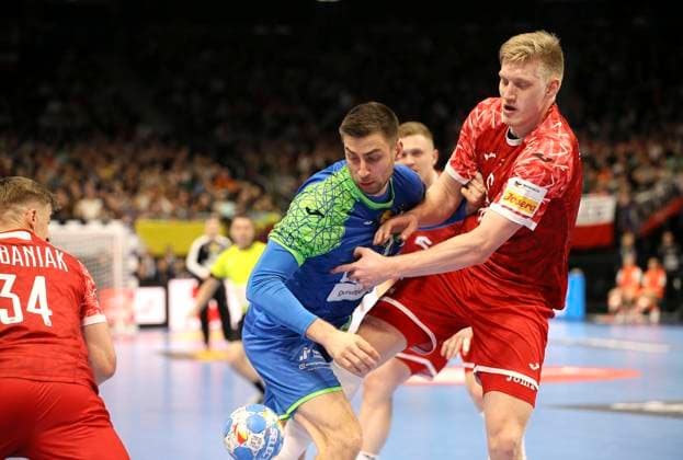 Photo Nejc CEHTE Slovenia vs Ariel PIETRASIK Poland , right European Handball Championship, preliminary round in Berlin , on Sat 13 01 2024 Poland Slovenia 25 32 Claus Bergmann DFL regulations prohibit any use of photographs as image sequences and or quasi video