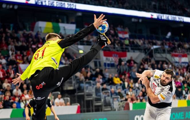 HANDBALL - EHF EURO 2024 MANNHEIM,GERMANY,16.JAN.24 - HANDBALL - EHF Men s European Championship, EM, Europameisterschaft 2024, group stage, Austria vs Spain. Image shows Tobias Wagner (AUT) and Sergey Hernandez Ferrer (ESP).  GEPAxpictures xEdgarxEisner