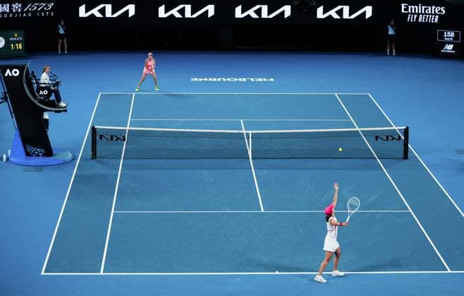 (240118) -- MELBOURNE, Jan. 18, 2024 -- Iga Swiatek (R) of Poland serves during the women s singles 2nd round match between Iga Swiatek of Poland and Danielle Collins of the United States at Australian Open tennis tournament in Melbourne, Australia, Jan. 18, 2024. ) (SP)AUSTRALIA-MELBOURNE-TENNIS-AUSTRALIAN OPEN MaxPing 