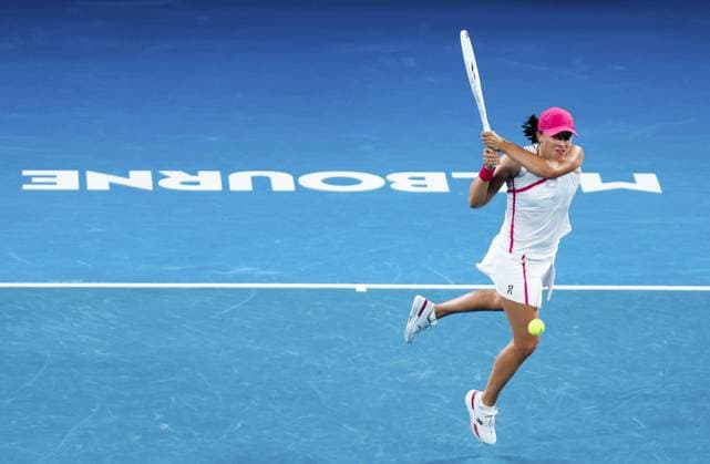 (240118) -- MELBOURNE, Jan. 18, 2024 -- Iga Swiatek of Poland returns a shot during the women s singles 2nd round match between Iga Swiatek of Poland and Danielle Collins of the United States at Australian Open tennis tournament in Melbourne, Australia, Jan. 18, 2024. ) (SP)AUSTRALIA-MELBOURNE-TENNIS-AUSTRALIAN OPEN MaxPing 
