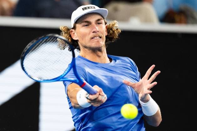 (240118) -- MELBOURNE, Jan. 18, 2024 -- Max Purcell returns a shot during the men s singles 2nd round match between Casper Ruud of Norway and Max Purcell of Australia at Australian Open tennis tournament in Melbourne, Australia, Jan. 18, 2024. (Photo by Xinhua) (SP)AUSTRALIA-MELBOURNE-TENNIS-AUSTRALIAN OPEN ChuxChen 
