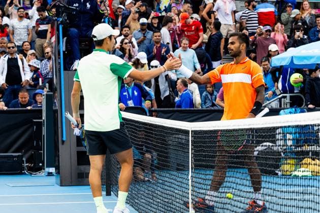 (240118) -- MELBOURNE, Jan. 18, 2024 -- Shang Juncheng (L) of China greets Sumit Nagal of India after their men s singles second round match at the Australian Open tennis tournament in Melbourne, Australia, Jan. 18, 2024. (Photo by Xinhua) (SP)AUSTRALIA-MELBOURNE-TENNIS-AUSTRALIAN OPEN ChuxChen 