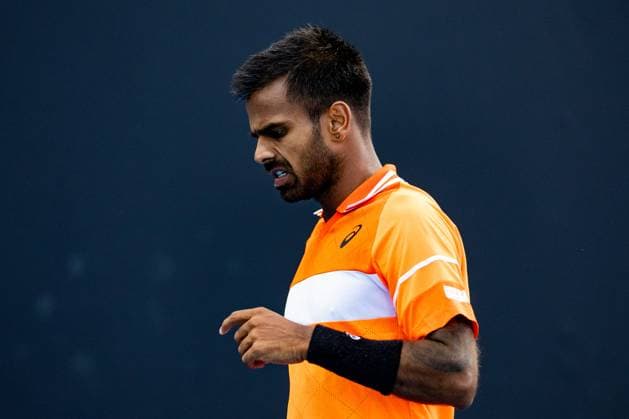 (240118) -- MELBOURNE, Jan. 18, 2024 -- Sumit Nagal of India reacts during the men s singles second round match between Shang Juncheng of China and Sumit Nagal of India at the Australian Open tennis tournament in Melbourne, Australia, Jan. 18, 2024. (Photo by Xinhua) (SP)AUSTRALIA-MELBOURNE-TENNIS-AUSTRALIAN OPEN ChuxChen 