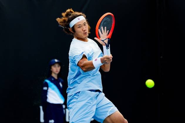 (240118) -- MELBOURNE, Jan. 18, 2024 -- Zhang Zhizhen of China hits a return during the men s singles second round match Ugo Humbert of France and Zhang Zhizhen of China at the Australian Open tennis tournament in Melbourne, Australia, Jan. 18, 2024. (Photo by Xinhua) (SP)AUSTRALIA-MELBOURNE-TENNIS-AUSTRALIAN OPEN ChuxChen 