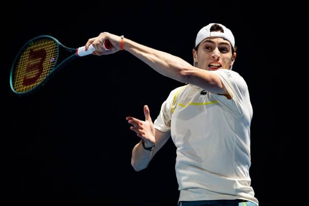 (240118) -- MELBOURNE, Jan. 18, 2024 -- Ugo Humbert of France hits a return during the men s singles second round match Ugo Humbert of France and Zhang Zhizhen of China at the Australian Open tennis tournament in Melbourne, Australia, Jan. 18, 2024. (Photo by Xinhua) (SP)AUSTRALIA-MELBOURNE-TENNIS-AUSTRALIAN OPEN ChuxChen 