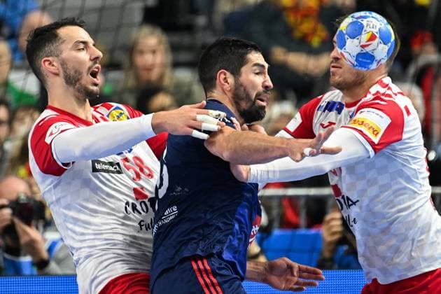 Koln, Germany, 180124. Lanxess Arena. EHF EURO 2024. Handball match of the second round of the European Championship, EM, Europameisterschaft group I, France - Croatia. In the photo: Nikola Karabatic, Zvonimir Srna. Photo: Ante Cizmic CROPIX Hrvatska Copyright: xxAntexCizmicx francuska_hrvatska54-180124
