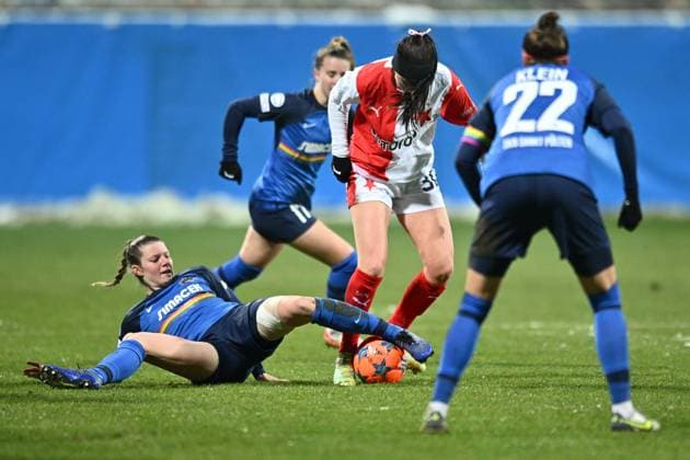 From left Claudia Wenger of St. Polten, Molly McLaughlin of Slavia in action during the St. Polten vs. Slavia Praha UEFA Women s Champions League match in Mlada Boleslav, Czech Republic, January 18, 2024. (CTKxPhoto RadekxPetrasek) CTKPhotoP2024011808371  CTKPhotoP2024011808371