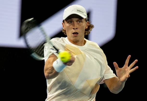 (240119) -- MELBOURNE, Jan. 19, 2024 -- Emil Ruusuvuori of Finland returns a shot during the men s singles second round match between Daniil Medvedev of Russia and Emil Ruusuvuori of Finland at the Australian Open tennis tournament in Melbourne, Australia, Jan. 18, 2024. (Photo by Xinhua) (SP)AUSTRALIA-MELBOURNE-TENNIS-AUSTRALIAN OPEN HuxJingchen 