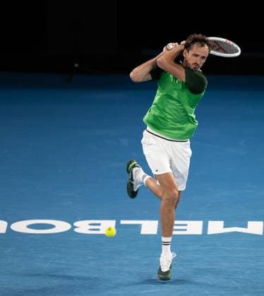 (240119) -- MELBOURNE, Jan. 19, 2024 -- Daniil Medvedev of Russia returns a shot during the men s singles second round match between Daniil Medvedev of Russia and Emil Ruusuvuori of Finland at the Australian Open tennis tournament in Melbourne, Australia, Jan. 18, 2024. (Photo by Xinhua) (SP)AUSTRALIA-MELBOURNE-TENNIS-AUSTRALIAN OPEN HuxJingchen 