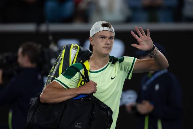 (240119) -- MELBOURNE, Jan. 19, 2024 -- Holger Rune greets spectators after the men s singles second round match between Arthur Cazaux of France and Holger Rune of Denmark at the Australian Open tennis tournament in Melbourne, Australia, Jan. 18, 2024. (Photo by Xinhua) (SP)AUSTRALIA-MELBOURNE-TENNIS-AUSTRALIAN OPEN ChuxChen 