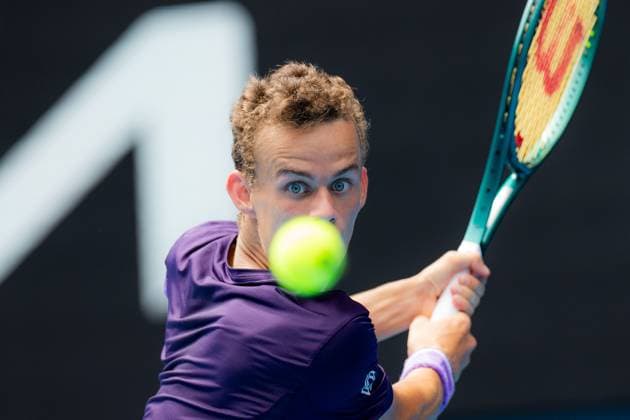(240119) -- MELBOURNE, Jan. 19, 2024 -- Luca Van Assche hits a return during the men s singles third round match between Stefanos Tsitsipas of Greece and Luca Van Assche of France at the Australian Open tennis tournament in Melbourne, Australia, Jan. 19, 2024. (Photo by Xinhua) (SP)AUSTRALIA-MELBOURNE-TENNIS-AUSTRALIAN OPEN ChuxChen 