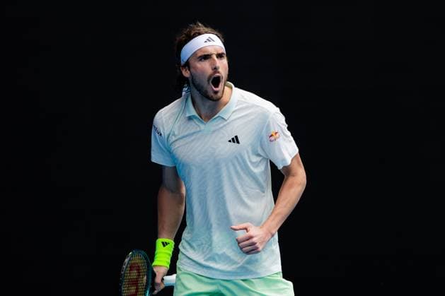(240119) -- MELBOURNE, Jan. 19, 2024 -- Stefanos Tsitsipas celebrates winning the men s singles third round match between Stefanos Tsitsipas of Greece and Luca Van Assche of France at the Australian Open tennis tournament in Melbourne, Australia, Jan. 19, 2024. (Photo by Xinhua) (SP)AUSTRALIA-MELBOURNE-TENNIS-AUSTRALIAN OPEN ChuxChen 