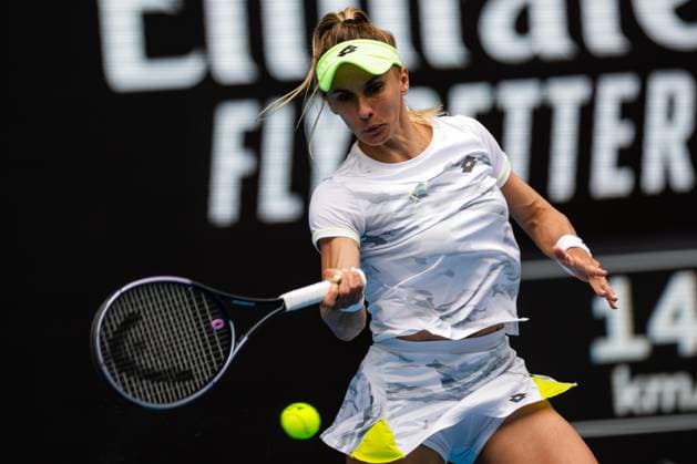 (240119) -- MELBOURNE, Jan. 19, 2024 -- Lesia Tsurenko hits a return during the women s singles third round match between Aryna Sabalenka of Belarus and Lesia Tsurenko of Ukraine at the Australian Open tennis tournament in Melbourne, Australia, Jan. 19, 2024. (Photo by Xinhua) (SP)AUSTRALIA-MELBOURNE-TENNIS-AUSTRALIAN OPEN ChuxChen 