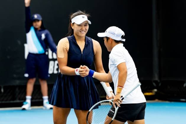 (240119) -- MELBOURNE, Jan. 19, 2024 -- Guo Hanyu (L) Jiang Xinyu celebrate during the women s doubles first round match between Bibiane Schoofs of the Netherlands Kimberley Zimmermann of Belgium and Guo Hanyu Jiang Xinyu of China at the Australian Open tennis tournament in Melbourne, Australia, Jan. 19, 2024. (Photo by Xinhua) (SP)AUSTRALIA-MELBOURNE-TENNIS-AUSTRALIAN OPEN ChuxChen 