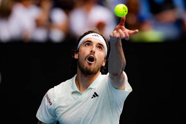(240119) -- MELBOURNE, Jan. 19, 2024 -- Stefanos Tsitsipas serves during the men s singles third round match between Stefanos Tsitsipas of Greece and Luca Van Assche of France at the Australian Open tennis tournament in Melbourne, Australia, Jan. 19, 2024. (Photo by Xinhua) (SP)AUSTRALIA-MELBOURNE-TENNIS-AUSTRALIAN OPEN ChuxChen 