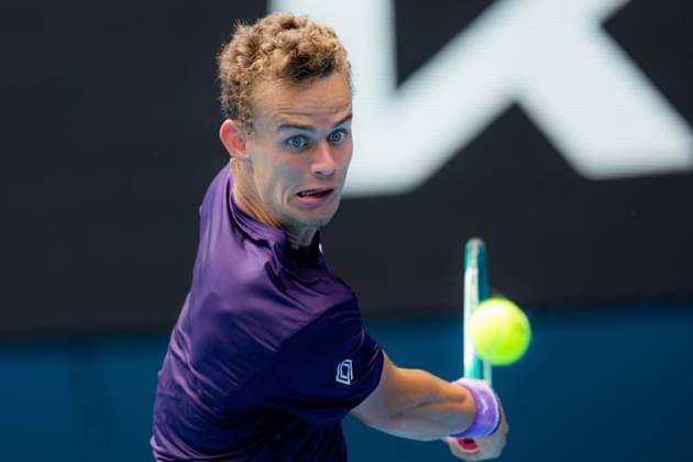 (240119) -- MELBOURNE, Jan. 19, 2024 -- Luca Van Assche hits a return during the men s singles third round match between Stefanos Tsitsipas of Greece and Luca Van Assche of France at the Australian Open tennis tournament in Melbourne, Australia, Jan. 19, 2024. (Photo by Xinhua) (SP)AUSTRALIA-MELBOURNE-TENNIS-AUSTRALIAN OPEN ChuxChen 