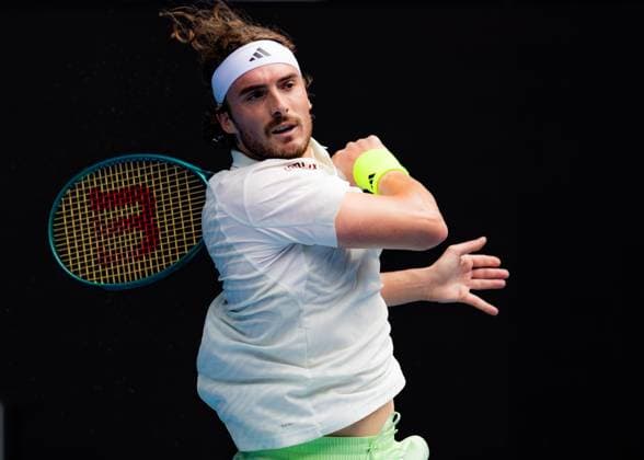(240119) -- MELBOURNE, Jan. 19, 2024 -- Stefanos Tsitsipas competes during the men s singles third round match between Stefanos Tsitsipas of Greece and Luca Van Assche of France at the Australian Open tennis tournament in Melbourne, Australia, Jan. 19, 2024. (Photo by Xinhua) (SP)AUSTRALIA-MELBOURNE-TENNIS-AUSTRALIAN OPEN ChuxChen 