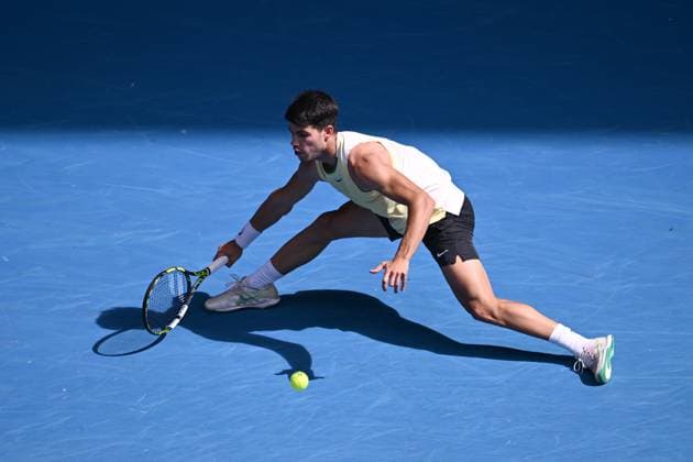 TENNIS AUSTRALIAN OPEN, Carlos Alcaraz of Spain in action during his 3rd round match against Juncheng Shang of China on Day 7 of the 2024 Australian Open at Melbourne Park in Melbourne, Saturday, January 20, 2024. ( NO ARCHIVING, EDITORIAL USE ONLY, NO USE IN BOOKS WITHOUT CONSENT MELBOURNE VICTORIA AUSTRALIA  Copyright: xJOELxCARRETTx 20240120001891276607