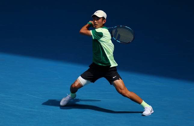 Juncheng Shang of China in action Australian Open, Day Seven, Tennis, Melbourne Park, Melbourne, Australia - 20 Jan 2024  Copyright: xEllaxLing Shutterstockx 14306285at