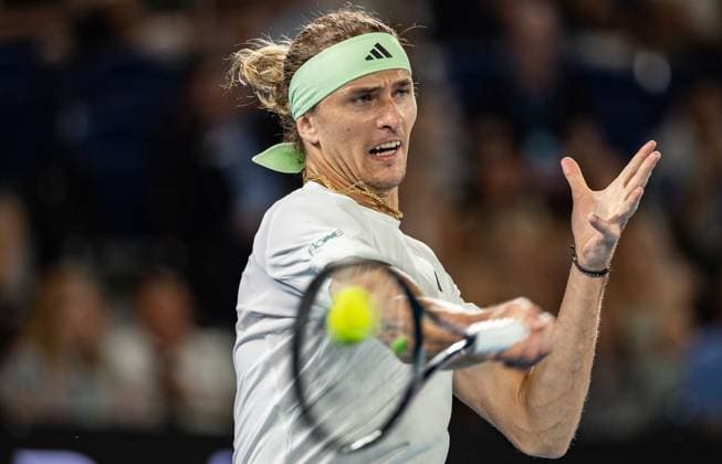 (240120) -- MELBOURNE, Jan. 20, 2024 -- Alexander Zverev hits a return during the men s singles third round match between Alexander Zverev of Germany and Alex Michelsen of the United States at the Australian Open tennis tournament in Melbourne, Australia, Jan. 20, 2024. (Photo by Xinhua) (SP)AUSTRALIA-MELBOURNE-TENNIS-AUSTRALIAN OPEN HuxJingchen 
