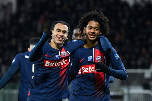 Senny Mayulu ( 13 - PSG ) celebrates with Ethan Mbappe ( 18 - PSG ) during the French Cup match between US Orleans and Paris Saint Germain at Stade de la Source on January 20, 2024 in Orleans, France. ( Photo by federico pestellini panoramic ) - FOOTBALL : Orleans vs PSG - Coupe de France - 20 01 2024 FedericoPestellini Panoramic 