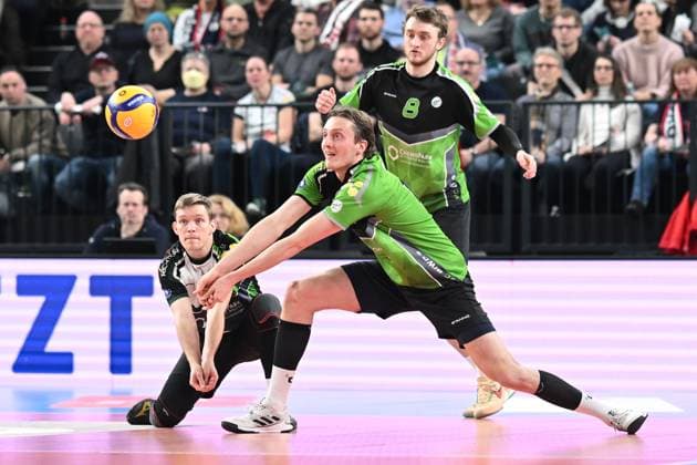 Volleyball I Men I 2023 2024 I Bundesliga I 15 Matchday I SVG Lüneburg VC Bitterfeld Wolfen I 20 1 2024 Michael Hamann 1, VC Bitterfeld Wolfen and Ben Simon Bonin 16, VC Bitterfeld Wolfen receiving the ball Logan House 8, VC Bitterfeld Wolfen watching Lüneburg LKH Arena Niedersachsen Germany Copyright: xLobeca AndreasxHannigx