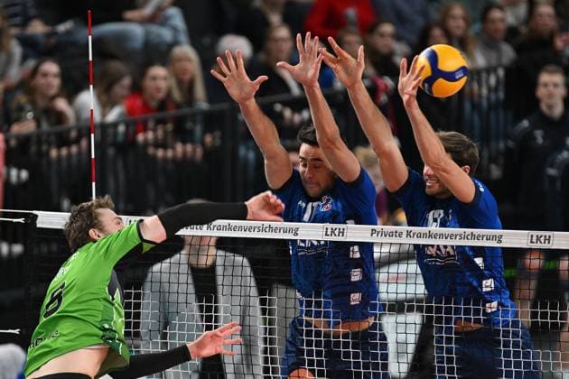 Volleyball I Men I 2023 2024 I Bundesliga I 15 Matchday I SVG Lüneburg VC Bitterfeld Wolfen I 20 1 2024 Matus Jalovecky 5, VC Bitterfeld Wolfen overcomes the double block of Xander Wolf Wassenaar Ketrzynski 11, SVG Lüneburg and Matthew Knigge 13, SVG Lüneburg Lüneburg LKH Arena Niedersachsen Germany Copyright: xLobeca AndreasxHannigx