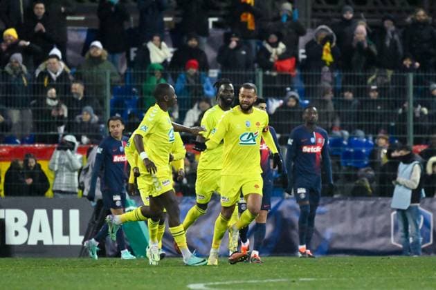 Nicolas Saint Ruf ( 5 - Orleans ) celebrates with teammates during the French Cup match between US Orleans and Paris Saint Germain at Stade de la Source on January 20, 2024 in Orleans, France. ( Photo by federico pestellini panoramic ) - FOOTBALL : Orleans vs PSG - Coupe de France - 20 01 2024 FedericoPestellini Panoramic 