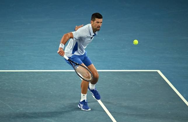 TENNIS AUSTRALIAN OPEN, Novak Djokovic of Serbia returns during his 4th round match against Adrian Mannarino of France on Day 8 of the 2024 Australian Open at Melbourne Park in Melbourne, Sunday, January 21, 2024. ( NO ARCHIVING, EDITORIAL USE ONLY, NO USE IN BOOKS WITHOUT CONSENT MELBOURNE VICTORIA AUSTRALIA  Copyright: xLUKASxCOCHx 20240121001891661437