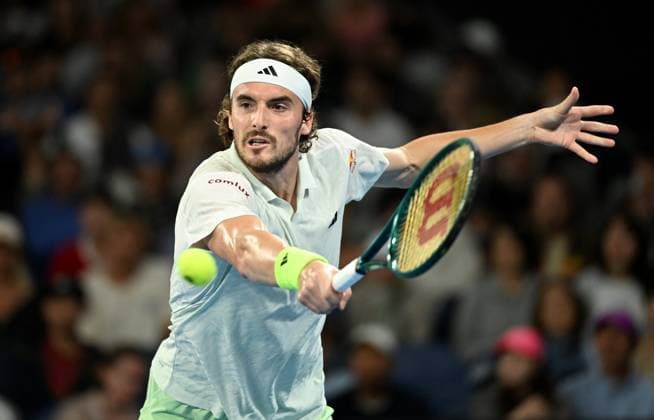 TENNIS AUSTRALIAN OPEN, Stefanos Tsitsipas of Greece returns during his 4th round match against Taylor Fritz of USA on Day 8 of the 2024 Australian Open at Melbourne Park in Melbourne, Sunday, January 21, 2024. ( NO ARCHIVING, EDITORIAL USE ONLY, NO USE IN BOOKS WITHOUT CONSENT MELBOURNE VICTORIA AUSTRALIA  Copyright: xJAMESxROSSx 20240121001891670430