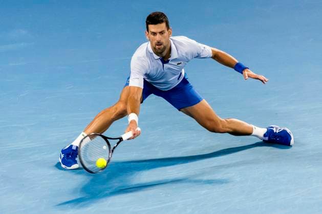 MELBOURNE, VIC - JANUARY 21: Novak Djokovic of Serbia in action during the 4th round of the 2024 Australian Open on January 21 2024, at Melbourne Park in Melbourne, Australia. (Photo by Jason Heidrich Icon Sportswire) TENNIS: JAN 21 Australian Open EDITORIAL USE ONLY Icon240121130