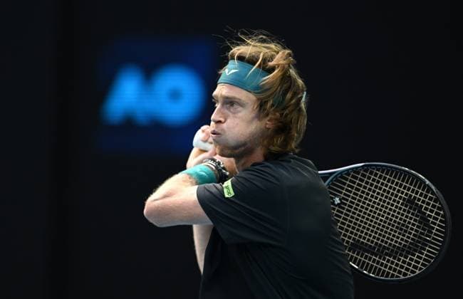 TENNIS AUSTRALIAN OPEN, Andrey Rublev of Russia returns during his 4th round match against Alex de Minaur of Australia on Day 8 of the 2024 Australian Open at Melbourne Park in Melbourne, Sunday, January 21, 2024. ( NO ARCHIVING, EDITORIAL USE ONLY, NO USE IN BOOKS WITHOUT CONSENT MELBOURNE VICTORIA AUSTRALIA  Copyright: xLUKASxCOCHx 20240121001891714171