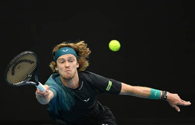 TENNIS AUSTRALIAN OPEN, Andrey Rublev of Russia returns during his 4th round match against Alex de Minaur of Australia on Day 8 of the 2024 Australian Open at Melbourne Park in Melbourne, Sunday, January 21, 2024. ( NO ARCHIVING, EDITORIAL USE ONLY, NO USE IN BOOKS WITHOUT CONSENT MELBOURNE VICTORIA AUSTRALIA  Copyright: xLUKASxCOCHx 20240121001891716455