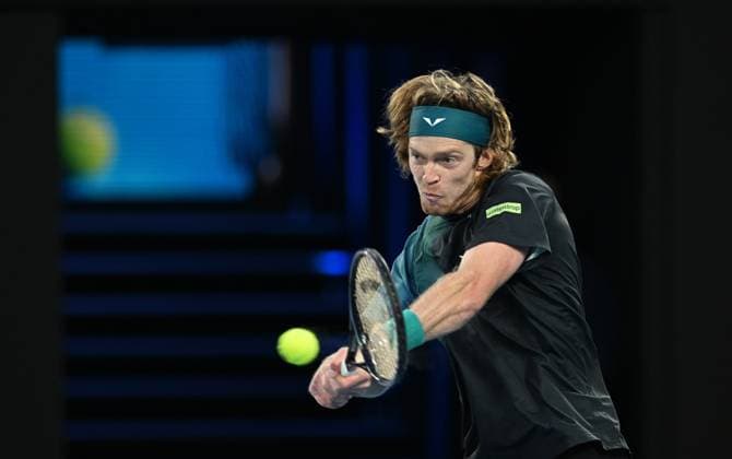 TENNIS AUSTRALIAN OPEN, Andrey Rublev of Russia returns during his 4th round match against Alex de Minaur of Australia on Day 8 of the 2024 Australian Open at Melbourne Park in Melbourne, Sunday, January 21, 2024. ( NO ARCHIVING, EDITORIAL USE ONLY, NO USE IN BOOKS WITHOUT CONSENT MELBOURNE VICTORIA AUSTRALIA  Copyright: xLUKASxCOCHx 20240121001891729177