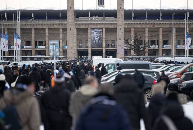 Soccer, Men, Season 2023 2024, 2 Bundesliga 18 Matchday , Hertha BSC Fortuna Düsseldorf, Memorial to the late President Kay Bernstein Hertha BSC , in the picture the funeral march in front of the east gate of the Olympic Stadium, there hangs a photo of Kay Bernstein, 21 01 2024, Copyright: xMatthiasxKochx
