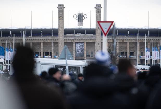 Soccer, Men, Season 2023 2024, 2 Bundesliga 18 Matchday , Hertha BSC Fortuna Düsseldorf, Memorial to the late President Kay Bernstein Hertha BSC , in the picture the funeral march in front of the east gate of the Olympic Stadium, there hangs a photo of Kay Bernstein, 21 01 2024, Copyright: xMatthiasxKochx