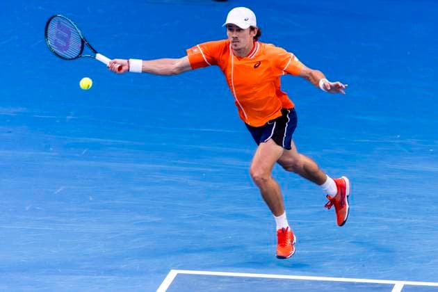 MELBOURNE, VIC - JANUARY 21: Alex de Minaur of Australia in action during the 4th round of the 2024 Australian Open on January 21 2024, at Melbourne Park in Melbourne, Australia. (Photo by Jason Heidrich Icon Sportswire) TENNIS: JAN 21 Australian Open EDITORIAL USE ONLY Icon240121264