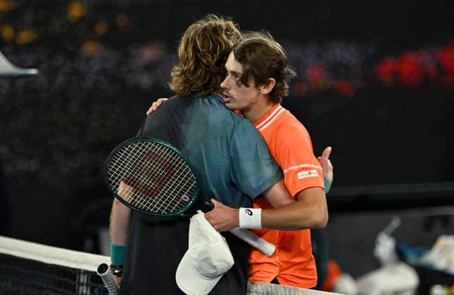 TENNIS AUSTRALIAN OPEN, Alex de Minaur of Australia (right) reacts with Andrey Rublev of Russia after losing his 4th round match on Day 8 of the 2024 Australian Open at Melbourne Park in Melbourne, Sunday, January 21, 2024. ( NO ARCHIVING, EDITORIAL USE ONLY, NO USE IN BOOKS WITHOUT CONSENT MELBOURNE VICTORIA AUSTRALIA  Copyright: xLUKASxCOCHx 20240121001891767566