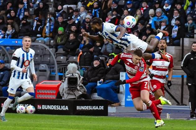 Soccer 2 Bundesliga, Hertha BSC Fortuna Duesseldorf 21 01 2024, xdanx, Soccer 2 Bundesliga, Hertha BSC Fortuna Duesseldorf, v l Deyovaisio Zeefuik Hertha BSC 34 ,Christoph Tzolis Fortuna Duesseldorf 7 ,duel, duel, fight, tackle DFL DFB REGULATIONS PROHIBIT ANY USE OF PHOTOGRAPHS as IMAGE SEQUENCES and or QUASI VIDEO Photo Daniel Lakomski Mix1 Berlin Olympiastadion Berlin Berlin Germany EN Copyright: xDanielxLakomskix