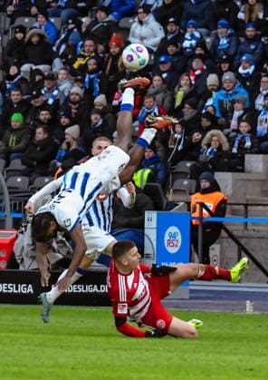 Soccer 2 Bundesliga, Hertha BSC Fortuna Duesseldorf 21 01 2024, xdanx, Soccer 2 Bundesliga, Hertha BSC Fortuna Duesseldorf, v l Deyovaisio Zeefuik Hertha BSC 34 ,Christoph Tzolis Fortuna Duesseldorf 7 ,duel, duel, fight, tackle DFL DFB REGULATIONS PROHIBIT ANY USE OF PHOTOGRAPHS as IMAGE SEQUENCES and or QUASI VIDEO Photo Daniel Lakomski Mix1 Berlin Olympiastadion Berlin Berlin Germany EN Copyright: xDanielxLakomskix